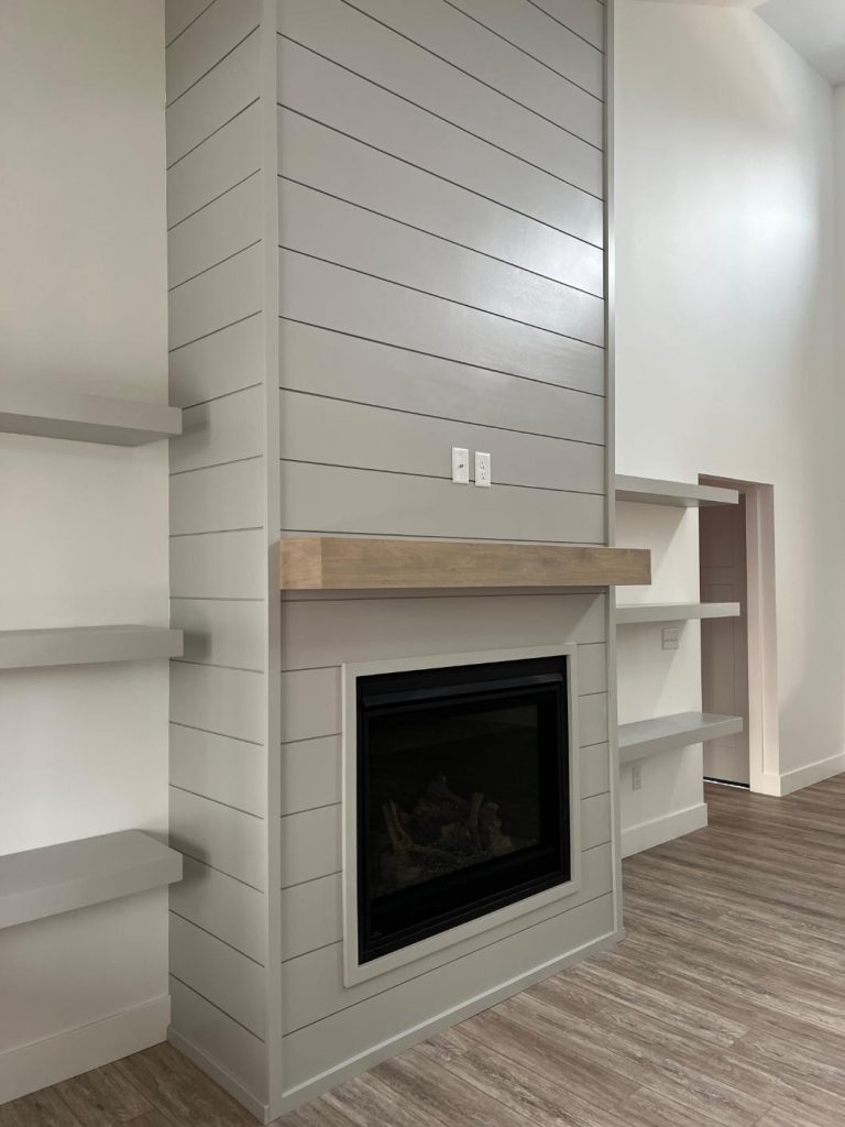 fireplace with built in shelving